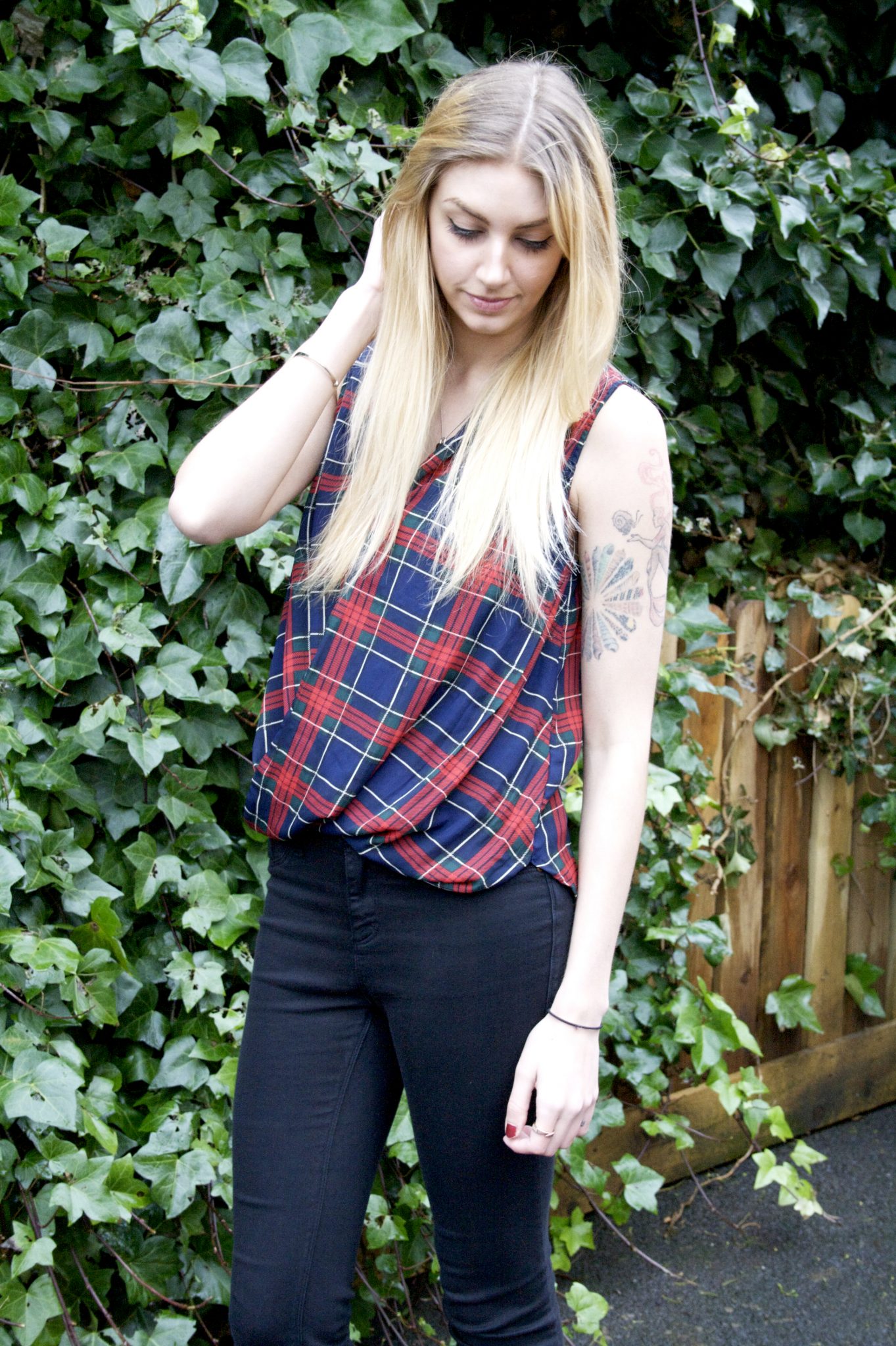Manchester based fashion and lifestyle blogger. Tiger mist tartan vest, river island jeans, toni and guy blonde, tattoos.