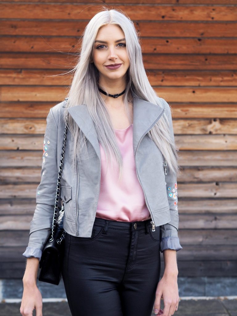 Manchester based fashion and lifestyle blogger Laura Kate Lucas | Dezzal Outfit Post featuring pink silk cami and grey embroidered biker jacket