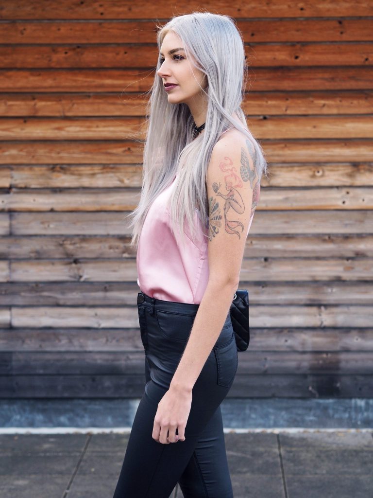 Manchester based fashion and lifestyle blogger Laura Kate Lucas | Dezzal Outfit Post featuring pink silk cami and grey embroidered biker jacket